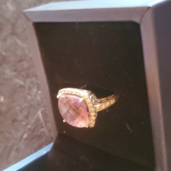 Silver ring with purple stone and tiny rhinestone border. Size 7. - Picture 2 of 3